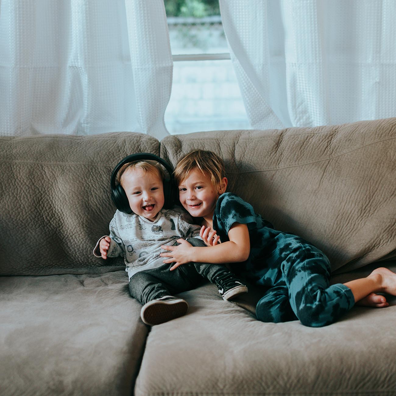 brothers hanging out on the sofa